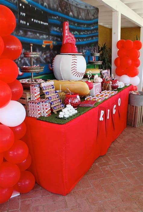 a baseball themed party with balloons and decorations