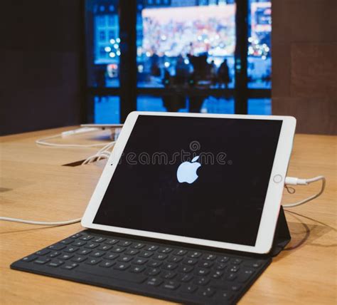 IPad Computer Tablet with Apple Logo in Apple Store Editorial Image - Image of shopping, pencil ...