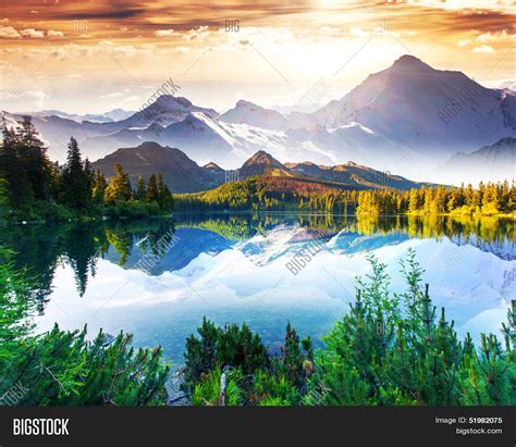 Fantastic sunny day is in mountain lake. Creative collage. Beauty world. Stock Photo & Stock ...