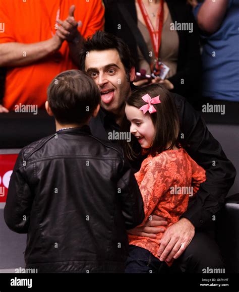 Ronnie O'Sullivan celebrates with his children Ronnie jnr (left) and ...