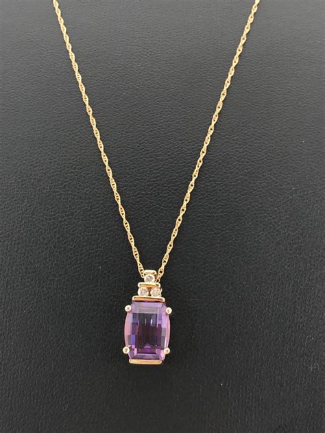 Lot - 14K Gold Amethyst Diamond Pendant Necklace