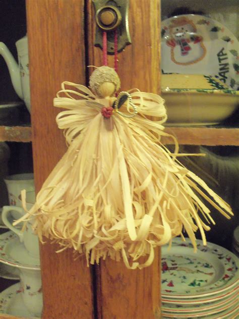 Angel made from Corn stalk/husk hanging on my pie safe. | Corn husk ...