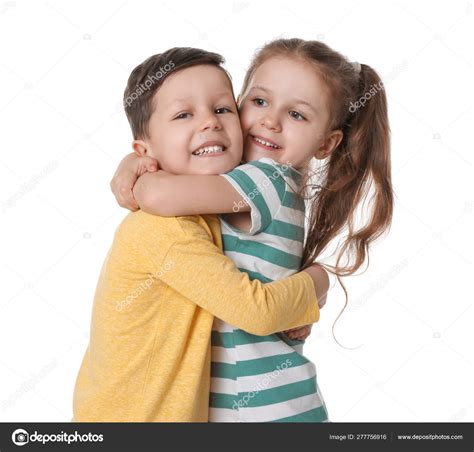 Cute little boy and girl hugging on white background Stock Photo by ©NewAfrica 277756916