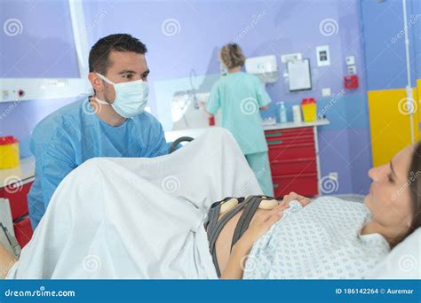 Woman Giving Birth in Labor Room Hospital Stock Photo - Image of hand, born: 186142264