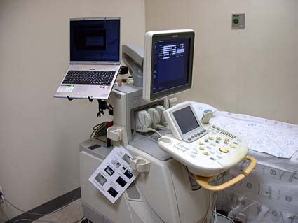 Portable ultrasound machine equipped with PACS device. The PACS device ...