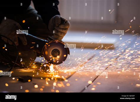 Cutting metal with angle grinder Stock Photo - Alamy