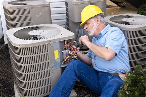 Air Conditioning Repairman At Work — Stock Photo © whitestar1955 #55686505