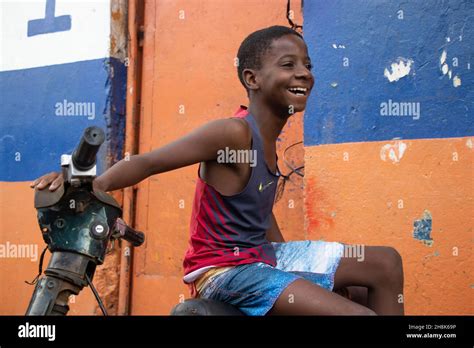 Portrait of a smiling young boy on the street in Samaná, Dominican Republic Stock Photo - Alamy