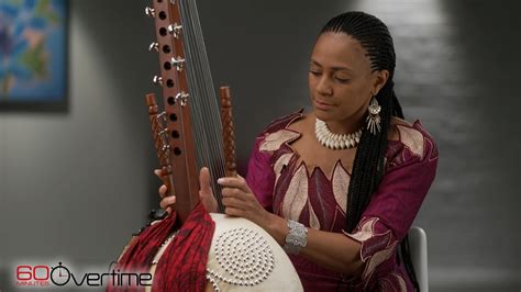 Playing the complex West African instrument called the kora | musical instrument | Sona Jobarteh ...