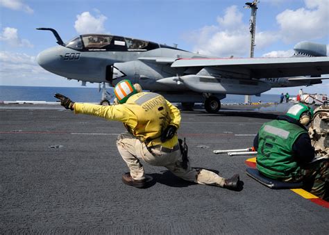 This Hilarious Video Shows Aircraft Carrier Officers Having Too Much Fun Launching Aircraft ...