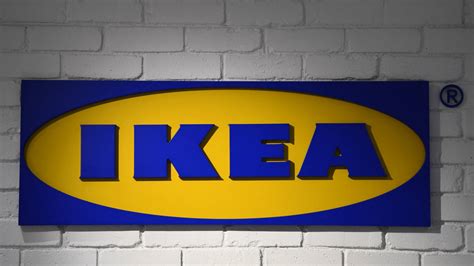 Download IKEA Logo Brick Wall Wallpaper | Wallpapers.com