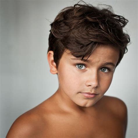 Close up Boy with tanned skin and blue eyes Photo by Benedicte Brocard #littleboyquotes Close up ...