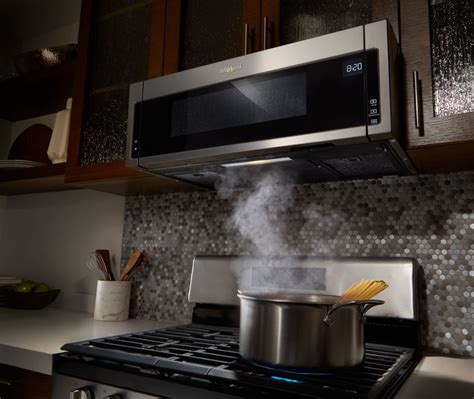 Whirlpool 1.1 Cu. Ft. Low Profile Over-the-Range Microwave Hood Combination Stainless steel ...