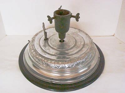 ANTIQUE REVOLVING MUSICAL CHRISTMAS TREE STAND -- Antique Price Guide Details Page