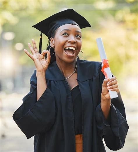 Premium Photo | Graduate scroll happy black woman and okay sign for ...