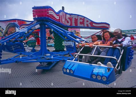 Family in Twister fun fair ride Stock Photo: 5664746 - Alamy