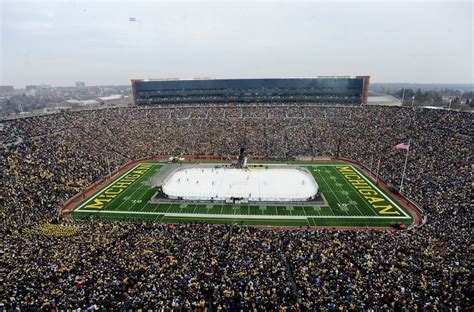 Michigan Stadium beginning to transform into NHL Winter Classic ice ...