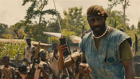 Idris Elba gives a terrifying performance as a warlord training child soldiers in an unnamed ...