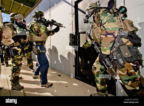 FBI SWAT team practices breaching a room at a "Live Fire Kill House ...