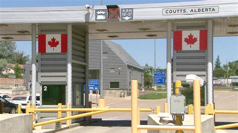 Officers seize small arsenal of guns at southern Alberta border crossing - Calgary - CBC News