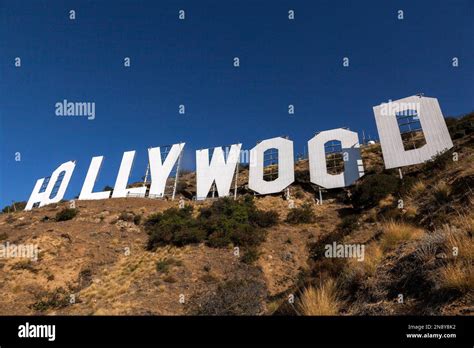 Painting crews set up on the base of the Hollywood Sign in Los Angeles ...