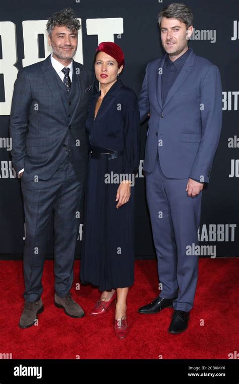 LOS ANGELES - OCT 15: Taika Waititi, Chelsea Winstanley, Carthew Neal at the "Jojo Rabbit ...