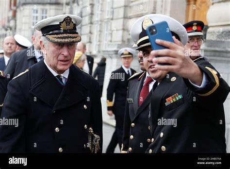 An officer of the Saudi Arabia Navy takes a selfie with the Prince of Wales, Admiral of the ...