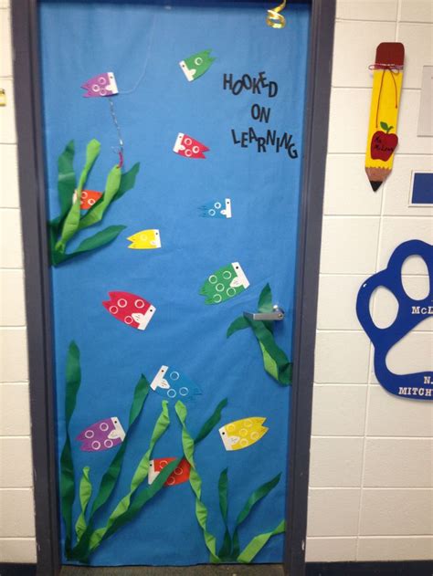 Fish/ ocean theme classroom door | Ocean theme classroom, Teacher door decorations, Classroom themes