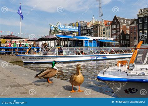 Dancing Canal Houses of Damrak, Amsterdam, Netherlands Editorial ...