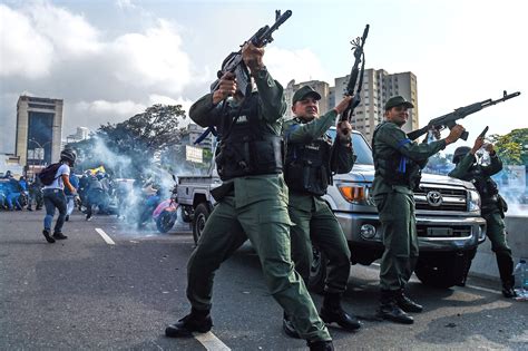 PHOTOS: Uprising in Venezuela as troops join opposition leaders on the ...