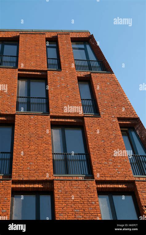 Facade of modern brick apartment house, conceptual design Stock Photo ...