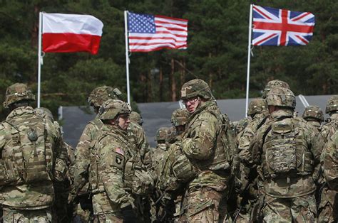 Polish leader welcomes NATO troops, hails ‘historic moment’ | The Spokesman-Review