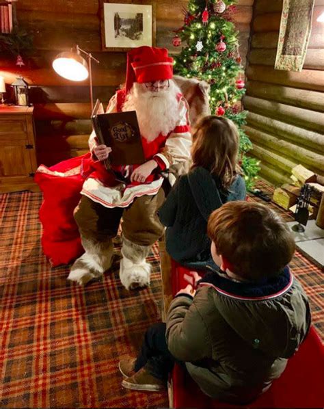 Robbie Williams' children Teddy, Charlie and Coco meet Santa – see photo