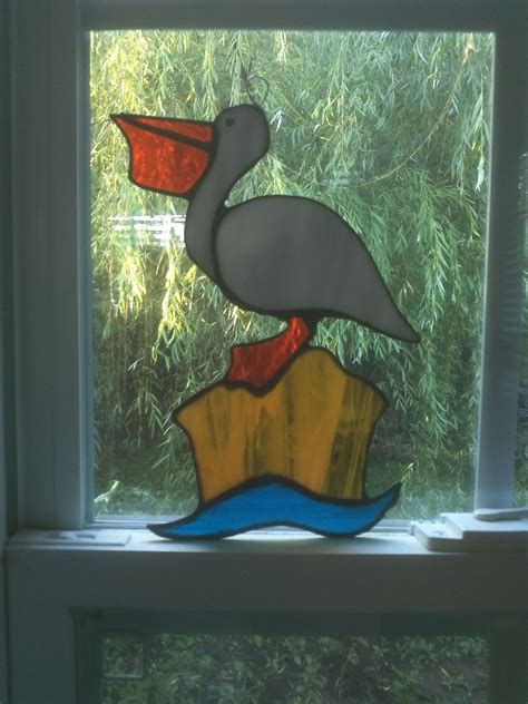 Stained Glass Pelican in 2023 | Stained glass birds, Stained glass ...