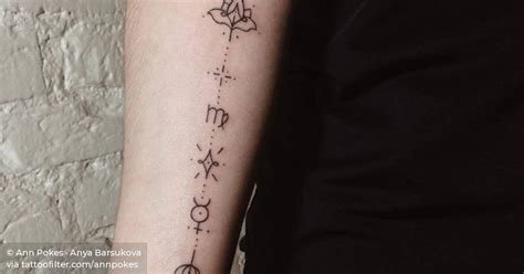 Hand poked symbols, including Virgo Zodiac sign and