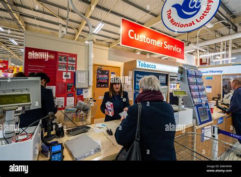 The customer service desk at Tesco Express in Longton, serving ...