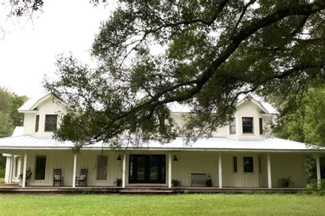 Exterior Updates: Our White Farmhouse with a Metal Roof - Daly Digs