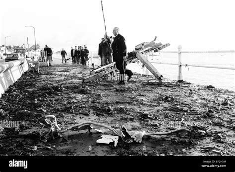 Penlee Life Boat Disaster wreckage from lifeboat is brought ashore including glove and sports ...