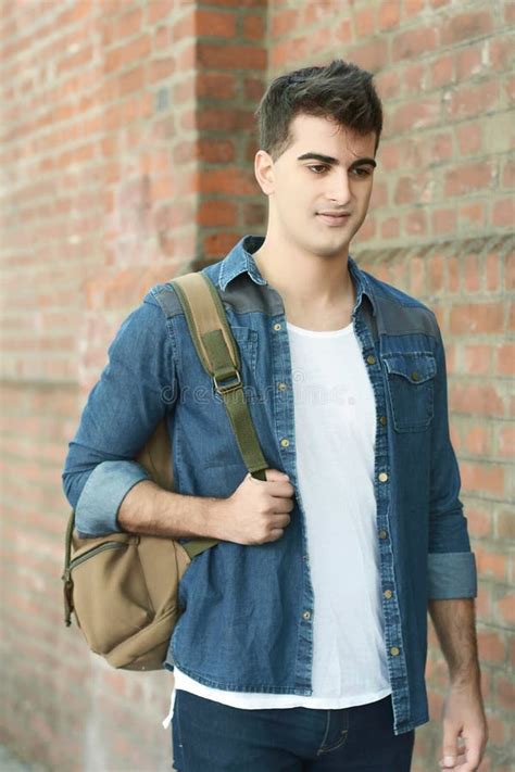 Young man with a backpack stock photo. Image of outdoor - 122867772