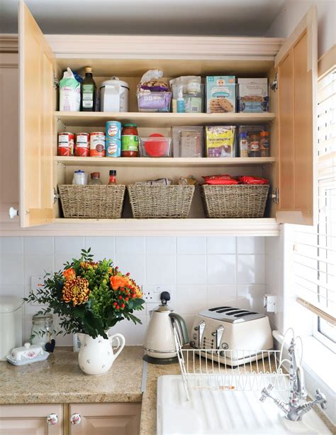 How To Organize Your Kitchen Cabinets & Create Space - Dainty Dress Diaries