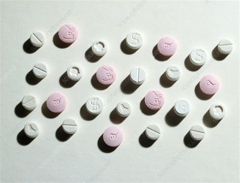 Ecstasy tablets - Stock Image - M372/0221 - Science Photo Library