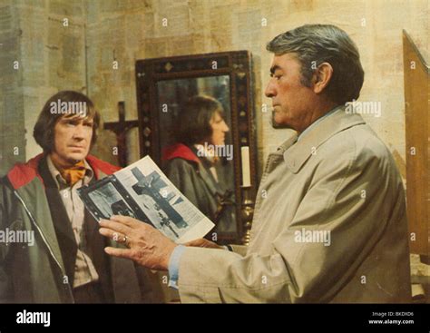 The omen 1976 david warner hi-res stock photography and images - Alamy