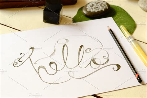 The word "hello" in calligraphy | High-Quality Education Stock Photos ~ Creative Market