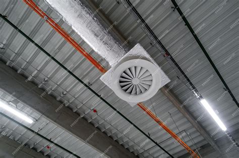 Premium Photo | Air ventilation system on the ceiling in a large warehouse