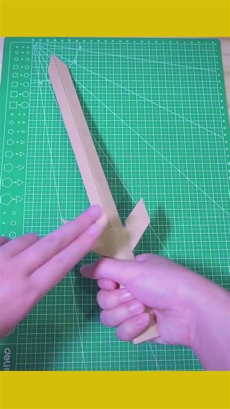 A sword made of paper [Video] in 2020 | Paper crafts diy kids, Cool paper crafts, Sword craft ...