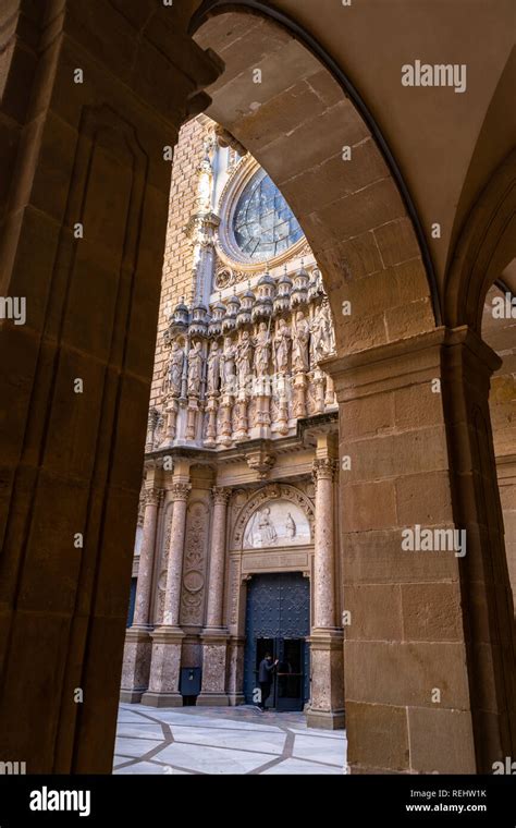 Interior view of the entrance to the monastery of Montserrat, person entering the church ...