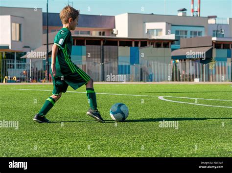 football on green field Stock Photo - Alamy