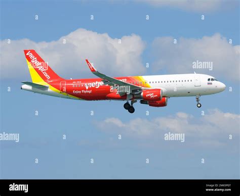 Thai VietJet Air airline Airbus A320 aircraft flying. Low-cost airline Thai VietJet Aviation ...