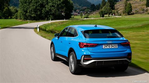 2020 Audi Q3 Sportback (Color: Turbo Blue) - Rear Three-Quarter | Caricos