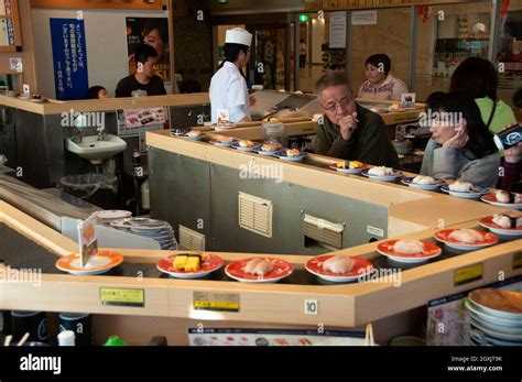 Sushi and nigiri on a conveyor belt at a restaurant, Narita ...